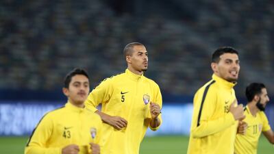 Captain Ismail Ahmed, centre, focuses on the job at hand for Al Ain.