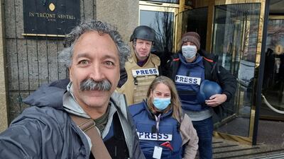 Fox News cameraman Pierre Zakrzewski, who was killed in Ukraine after the vehicle in which he was travelling was struck by incoming fire, poses for a selfie with colleagues in Kyiv. Fox News Sunday Handout via Reuters