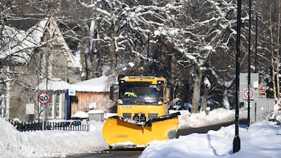 A snow plough clears snow from a road in Braemar. Getty Images