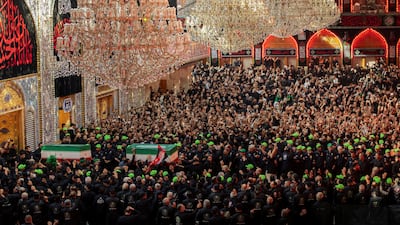 The funeral procession has moved over the border into Iraq before the coffins are returned for burial in Khamenei's homeland. Reuters