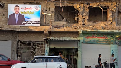 An electoral banner for a candidate is seen in Iraq's second city of Mosul, ahead of the upcoming parliamentary elections. AFP