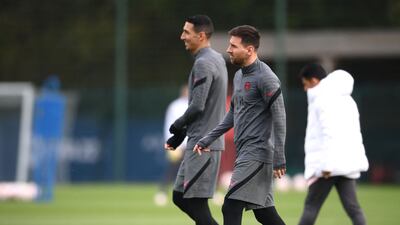 Lionel Messi and Angel Di Maria take part in a PSG training session. AFP