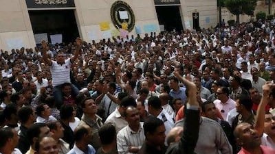 Police officers protest in Cairo last October during a nationwide strike for better salaries and a purge of former regime officials.
