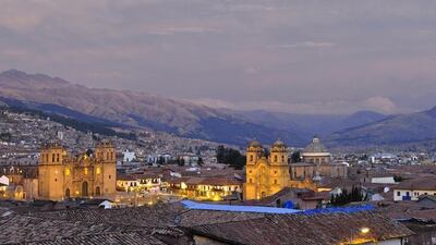 An overview of the central Plaza de Armas in Cusco, which is made up of arcaded restaurants. Getty Images