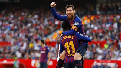 Barcelona's Lionel Messi celebrates scoring their second goal with Ousmane Dembele. He would score a hat-trick as they won 4-2. Reuters