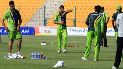 Pakistan players feel the heat during their training session at Zayed Cricket Stadium in Abu Dhabi on Sunday.
