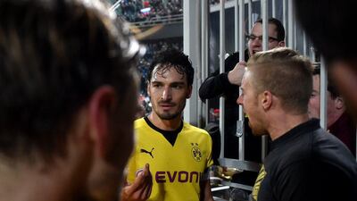 Borussia Dortmund defender Mats Hummels speaks with a fan after the team's Europa League loss to FK Krasnodar last week. Kirill Kudryavtsev / AFP / November 26, 2015