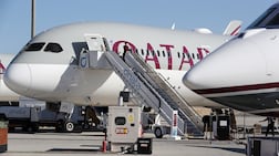 International flights through Doha will resume as Qatar reopens its airspace. Pawan Singh / The National