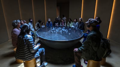 Visitors spend time learning about the power of including nature in everyday life. Victor Besa / The National