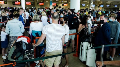 British tourists and residents line up to return to England at Faro airport, Algarve, Portugal, on June 5, 2021. EPA