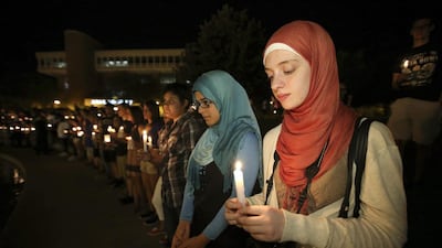 University of Central Florida students hold lit candles during a candlelight vigil in memory of American freelance journalist Steven Sotloff at the University of Central Florida in Orlando, Florida, USA on September 3, 2014. Sotloff was executed by the ISIL militants according to a video released by the group on a day earlier. He was a former student at the university. Alex Menendez/EPA