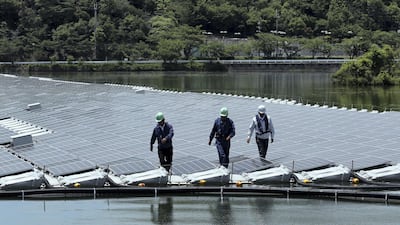Solar panels at a 2.3-megawatt floating solar power station operated in Japan. Bloomberg