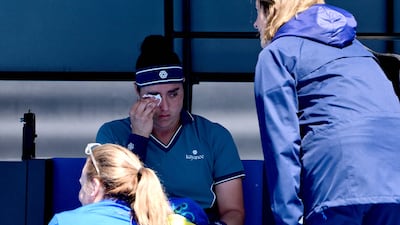 Ons Jabeur receives medical attention during her match against Camila Osorio after suffering from breathing issues. AFP