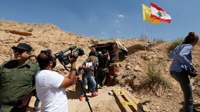 Lebanese and foreign media are seen in front the entrance of big cave of Al-Nusra terrorism groups in a mountainous area in Juroud of Arsal at the Lebanese -Syrian border. Nabil Mounzer.