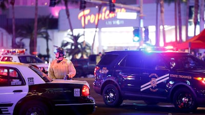 Las Vegas Metro Police officer stands by at a staging area in the junction of Tropicana Avenue and Las Vegas Boulevard South. Steve Marcus / Las Vegas Sun / Reuters