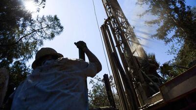 Diamond Well Drillers work to deepen the Brady family well in Woodland, California. Max Whittaker / Reuters