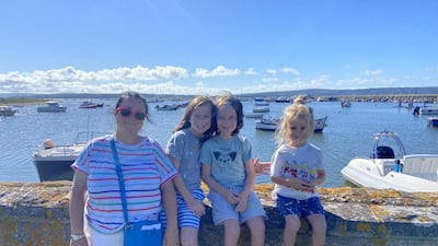 Gemma White with her three children, Indiana, Fox and Caspian, in Hampshire, one of the many parts of Britain they visited during their month-long stay. Photo: Gemma White
