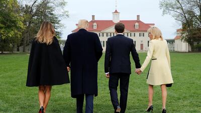 US President Donald Trump and first lady Melania Trump and French President Emmanuel Macron and Brigitte Macron walk to pose for a picture on a visit to the estate of the first US President George Washington in Mount Vernon, Virginia outside Washington, US, on April 23, 2018. Jonathan Ernst / Reuters