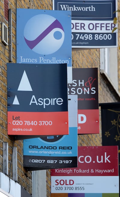 Estate agent's boards in London. Budget speculation is fuelling uncertainty across much of the property market. PA