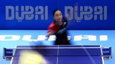 Mima Ito of Japan in action against Feng Tianwei of Singapore during Day 1 of the 2016 Table Tennis Asian Cup at Dubai World Trade Centre on April 28, 2016 in Dubai. (Photo by Warren Little/Getty Images)