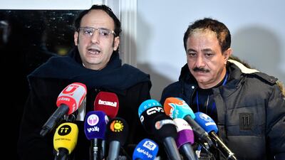 Abdul Malik al-Hajry and Abdul Majid Hanash, representatives for the Houthi rebel delegation, speak at a press briefing in Rimbo. TT News Agency via AP