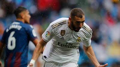 Real Madrid's Karim Benzema celebrates after scoring his side's first goal. AP Photo