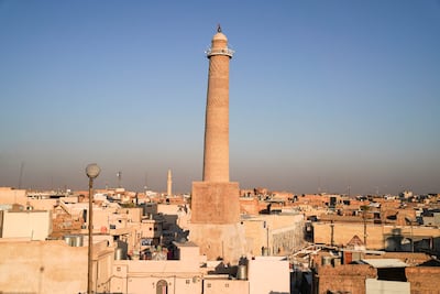 The leaning Al Hadba minaret at the Great Mosque of Al Nuri, which was rebuilt after it was blown up by ISIS. Getty Images