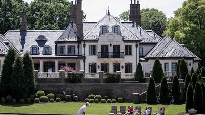 Northern Ireland's Rory McIlroy putts for a birdie on the seventh green during the final round of the Wells Fargo Championship at Quail Hollow Club in Charlotte, North Carolina, on Sunday, May 9. McIlroy won the tournament by one shot. EPA