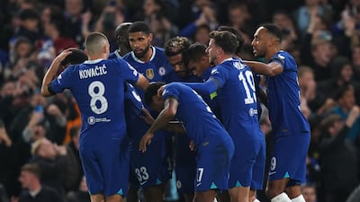 Chelsea's Wesley Fofana is mobbed by teammates after scoring. PA