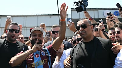 Egyptian forward Mohamed Salah gestures as he arrives at Istanbul Ataturk Airport. AFP