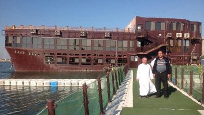 Palestinian Radwan Al Tamimi, left, arrived in Dubai at the age of 17 and moved to Abu Dhabi, where he set up a seafood kiosk on the Corniche. One day Sheikh Zayed stopped by and encouraged him to take his dreams forward, giving the young entrepreneur a vision, money and a utilities licence. He also gave him a nickname, and so Bu Tafish went on to open a boat restaurant and a chain of restaurants in the city. Courtesy Bu Tafish