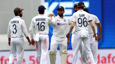 India celebrate the dismissal of Australia's Nathan Lyon, who was out for 13. AFP