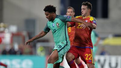 Portugal’s Eliseu in action with Andorra’s Victor Rodriguez. Vincent West / Reuters