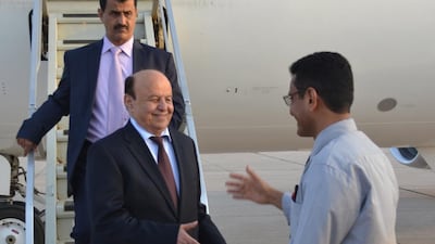 Yemeni President Abedrabbo Mansour Hadi arrives at an airbase adjoining the civilian airport in Yemen's war-ravaged southern city of Aden (AFP PHOTO / STR)