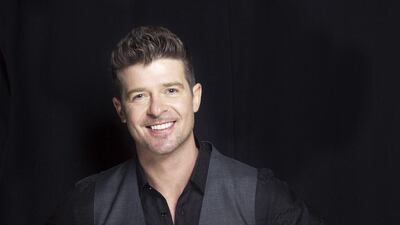 Singer-songwriter Robin Thicke is among the stars attending Blended. Victoria Will / AP