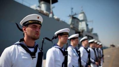 Members of the German navy stand guard as the frigate FGS Hamburg is docked at Port Rashid in Dubai. The Hamburg’s mission in the Arabian Gulf is to protect the aircraft carrier USS Dwight D Eisenhower. Christopher Pike / The National