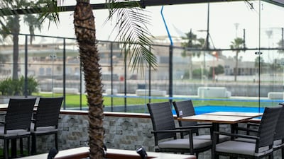 Players can enjoy a seating area for refreshments before or after a game.