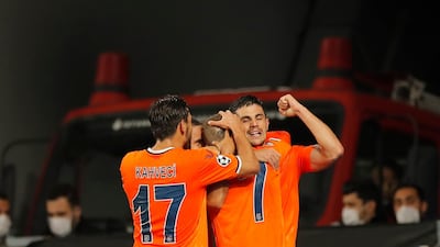 Basaksehir's Edin Visca celebrates with his teammates after scoring his side's second goal. AP