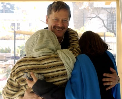War cameraman Peter Jouvenal in Kabul in 2004 with his wife and sister-in-law. AFP
