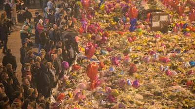 People attend a vigil for the victims of the Manchester Arena attack in the city in 2017. AFP