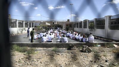 Prisoners wait to be released from a Houthi-run jail in Sanaa, Yemen. Reuters