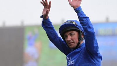 Frankie Dettori celebrates after winning the Godolphin Mile at the Dubai World Cup