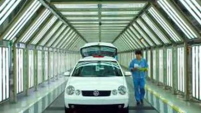 Volkswagens roll off an assembly line in Shanghai: "This is not a book about the decline of America," Fareed Zakaria writes, "but rather about the rise of everyone else."