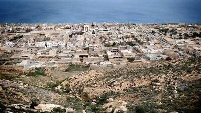 Rebels governing Libya's sun-bleached town of Derna, nestled at the foot of hills overlooking the Mediterranean, are frustrated by their new-found notoriety as an alleged home of hardline Islamists.