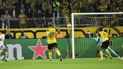Borussia Dortmund’s Andre Schurrle, left, scores the equaliser against Real Madrid. Martin Meissner / AP Photo
