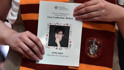 A mourner wearing a Hogwarts scarf holds the order of service for the funeral for journalist Lyra McKee at St Annes Cathedral. Getty Images