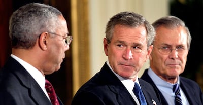 George W Bush, Colin Powell and Donald Rumsfeld in 2003, months after launching the Iraq war. Reuters