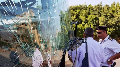 The shattered windscreen of a tourist bus at the site of the blast in Giza. Reuters