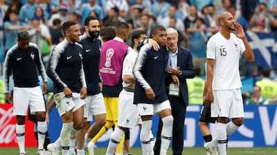 France manager Didier Deschamps celebrates victory with his players following France's 2-0 victory over Uruguay in the World Cup quarter-finals. Reuters
