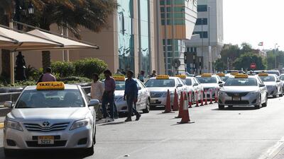 Taxi drivers waiting for passengers at Al Wahda mall in Abu Dhabi. Ravindranath K / The National